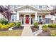 Inviting front entry with red door and landscaped walkway at 2402 Paddlers Cove Dr, Clover, SC 29710