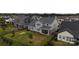 Aerial view of a two-story house with gray siding and a backyard at 2402 Paddlers Cove Dr, Clover, SC 29710