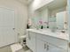 Modern bathroom with double vanity, white cabinets, and stylish fixtures at 2413 Riparian Way, Denver, NC 28037