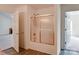 Bathroom featuring a shower and tub combination with sliding glass doors at 2511 Old Pond Dr, Lincolnton, NC 28092