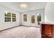 Bright room featuring neutral decor, big windows and access to deck at 2511 Old Pond Dr, Lincolnton, NC 28092