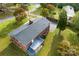 An aerial view showcasing the home's rear deck and yard at 3327 Deerwood Dr, Gastonia, NC 28054
