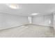 Finished basement offering neutral decor and recessed lighting at 3327 Deerwood Dr, Gastonia, NC 28054