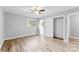Spacious bedroom featuring light gray walls and wood-look floors at 3327 Deerwood Dr, Gastonia, NC 28054