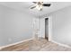 Light and airy bedroom with ceiling fan and closet at 3327 Deerwood Dr, Gastonia, NC 28054
