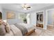 Bright bedroom with wood floors and ceiling fan at 3327 Deerwood Dr, Gastonia, NC 28054