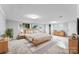 Main bedroom with ample space, natural light and wooden furniture at 3327 Deerwood Dr, Gastonia, NC 28054