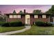Brick ranch house with landscaped yard and walkway at 3327 Deerwood Dr, Gastonia, NC 28054