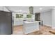 Updated kitchen with white cabinets and island at 3327 Deerwood Dr, Gastonia, NC 28054