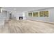 Open living area with hardwood floors and fireplace at 3327 Deerwood Dr, Gastonia, NC 28054