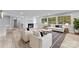 Bright living room with hardwood floors and white sofas at 3327 Deerwood Dr, Gastonia, NC 28054