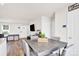 Dining area with four chairs and wood floors at 1197 Tangle Ridge Se Dr, Concord, NC 28025