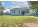 Backyard view featuring well-maintained lawn and patio at 1957 Tablerock Dr, York, SC 29745