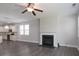 Spacious living room next to the kitchen featuring a fireplace and wood-look floors at 1957 Tablerock Dr, York, SC 29745