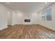 Spacious living room with hardwood floors and a modern fireplace at 327 Bezelle Ave, York, SC 29745