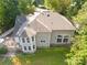 Aerial view of the home's back, highlighting the patio and backyard at 141 Red Brook Ln, Mooresville, NC 28117