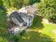 Aerial view of the home's back, highlighting the patio and backyard at 141 Red Brook Ln, Mooresville, NC 28117