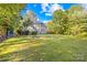 Large backyard with fire pit and ample green space at 141 Red Brook Ln, Mooresville, NC 28117