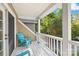 Private balcony with white railing and wooded views at 141 Red Brook Ln, Mooresville, NC 28117