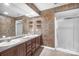 Double vanity bathroom with shower and decorative tile at 141 Red Brook Ln, Mooresville, NC 28117