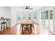 Bright breakfast area featuring a table, chairs, and sliding glass doors to the outdoor space at 141 Red Brook Ln, Mooresville, NC 28117