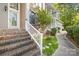 Brick steps leading to the front entrance, with a walkway alongside at 141 Red Brook Ln, Mooresville, NC 28117