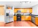 Well-equipped kitchen featuring stainless steel appliances and wood-toned cabinetry at 141 Red Brook Ln, Mooresville, NC 28117