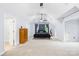 Bright primary bedroom with vaulted ceilings, neutral walls, and a comfortable bed at 141 Red Brook Ln, Mooresville, NC 28117