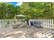 Private patio with seating area, umbrella, and grill at 141 Red Brook Ln, Mooresville, NC 28117