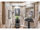 Chic powder room boasts a black pedestal sink, decorative wall tiles, and modern fixtures at 141 Red Brook Ln, Mooresville, NC 28117