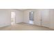 Spacious bedroom with neutral carpeting and ample closet space at 1499 Angela Ct, Lincolnton, NC 28092