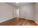 Simple bedroom with hardwood floors and two doors at 1499 Angela Ct, Lincolnton, NC 28092