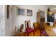 Dining area with wood hutch and two wooden chairs at 1499 Angela Ct, Lincolnton, NC 28092