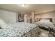 Basement bedroom with two beds and floral bedding at 165 Woodstream Cir, Mooresville, NC 28117