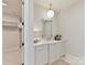 Chic powder room featuring elegant fixtures, marble countertops, and ample storage, offering a touch of luxury at 8111 Farm Crossing Ln # 2, Huntersville, NC 28078