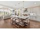 Beautiful kitchen featuring an oversized island, modern lighting and stainless appliances at 8111 Farm Crossing Ln # 2, Huntersville, NC 28078