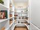 Well-organized walk-in pantry with custom shelving and ample storage for all your kitchen essentials at 8111 Farm Crossing Ln # 2, Huntersville, NC 28078