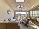 Inviting sunroom featuring comfortable seating and a seamless transition to the outdoors, perfect for relaxing and entertaining at 8111 Farm Crossing Ln # 2, Huntersville, NC 28078