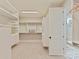 Spacious walk-in closet with custom shelving and ample storage, providing organization and convenience at 8111 Farm Crossing Ln # 2, Huntersville, NC 28078