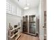 Dedicated wine cellar with dual temperature-controlled wine refrigerators and custom shelving at 8111 Farm Crossing Ln # 2, Huntersville, NC 28078
