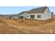 Homes with backyards and patio areas on a sloped lot at 4450 Doyle Ridge Rd, Maiden, NC 28650