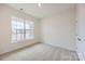 Bright bedroom with carpeted floors and large window at 4450 Doyle Ridge Rd, Maiden, NC 28650