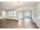 Bright dining room with hardwood floors and access to a sunroom at 4450 Doyle Ridge Rd, Maiden, NC 28650