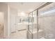 Main bathroom with double vanity, large shower, and tile flooring at 4456 Doyle Ridge Rd, Maiden, NC 28650