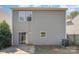 View of the back of the house and compact backyard at 4803 Roxfield Ln, Charlotte, NC 28215