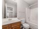 This bathroom features a vanity, toilet, and shower/tub combination at 4803 Roxfield Ln, Charlotte, NC 28215