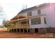 Exterior of home, featuring backyard, and back deck at 104 Arbor Dr, Waxhaw, NC 28173