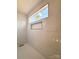 Modern bathroom featuring marble tile and a window above the shower at 104 Arbor Dr, Waxhaw, NC 28173