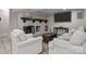 Finished basement with fireplace, comfortable seating, and large TV at 17929 Pages Pond Ct, Davidson, NC 28036