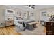 Spacious primary bedroom with wood floors and sitting area at 17929 Pages Pond Ct, Davidson, NC 28036